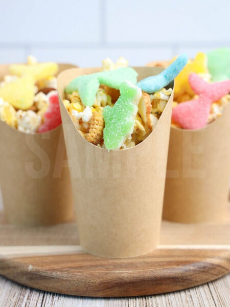 The Sea Life Snack Cups comes in a brown fry cup with rustic wood backdrop.