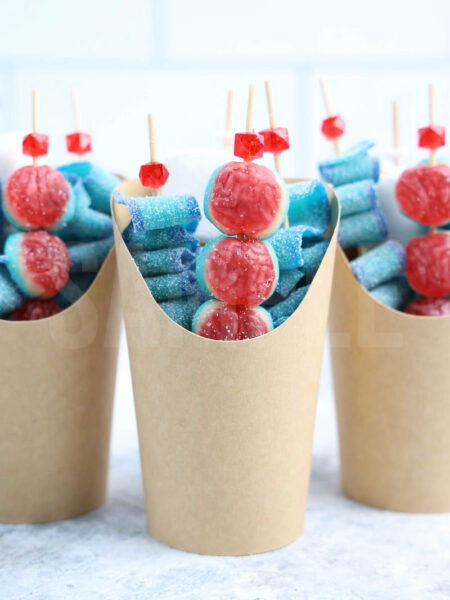 The Brain Candy Cups comes in a brown fry cup with marble wood backdrop.